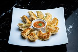 Himalayan Aroma signature dishes Chicken MomoLamb SekuwaThukpaGoat CurryVeg Thali